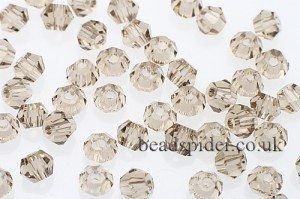 CBI424 Smoky Quartz Bi-cone  x 50