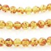 6mm Round Yellow/Honey Copal Amber.