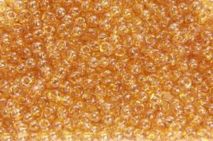 Transparent Amber Lustre Preciosa Seed Beads