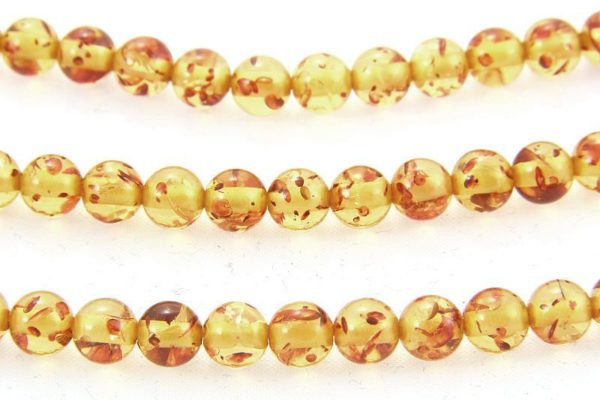6mm Round Yellow/Honey Copal Amber.